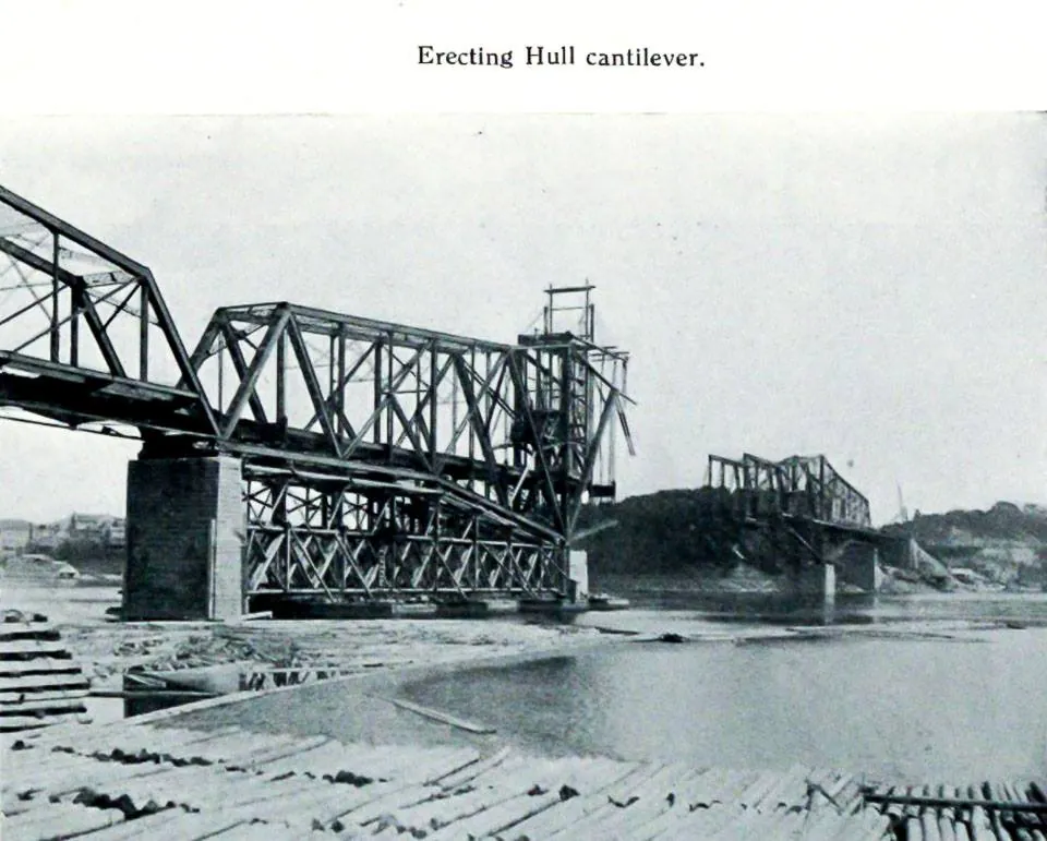 Erecting the Hull cantilever of the Interprovincial Bridge, Ottawa River, c. 1900. Historical photograph.